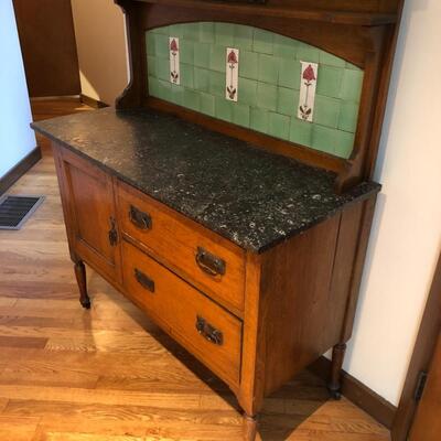 Beautiful Antique English Buffet Sideboard Table with Marble Top and Tile Back with Wheel Legs