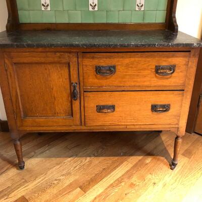 Beautiful Antique English Buffet Sideboard Table with Marble Top and Tile Back with Wheel Legs