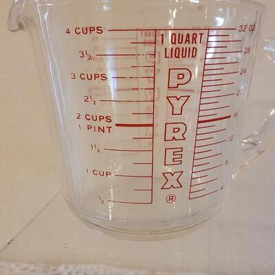 Lot 121: Kitchen Assortment- Measuring Cups, Cruet Bottle, Salt & Pepper Mill and Grater