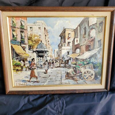 Painted Village Scene, well done and Artist signed bottom left.