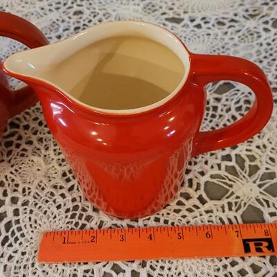 Lot 180: Vintage Universal Cambridge Red & Cream Pitchers