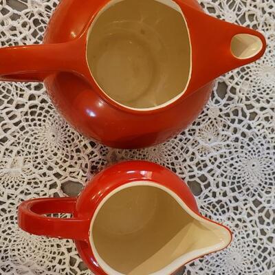 Lot 180: Vintage Universal Cambridge Red & Cream Pitchers