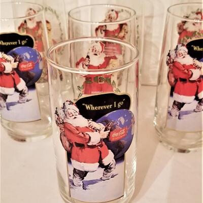 Lot #259 Group of 7 Collectible Christmas Coca-Cola Glasses