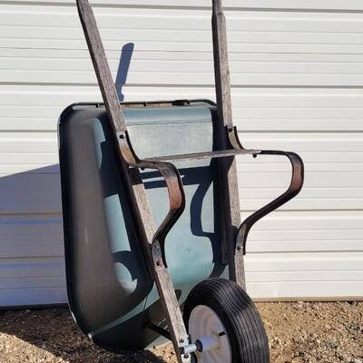 Lot 192: Vintage Fiberglass Green Wheelbarrow
