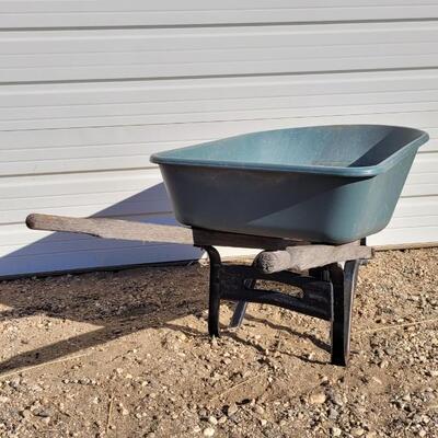 Lot 192: Vintage Fiberglass Green Wheelbarrow