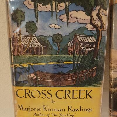 Lot 206: 1942 Cross Creek  & 1942 Cross Creek Cookery (Recipe Book) by Rawlings