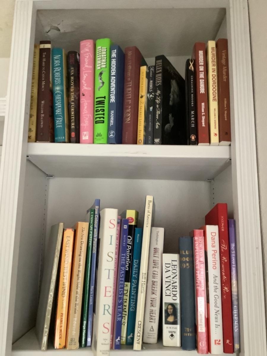 F536 Two Shelves of Mixed Genres of Books | EstateSales.org