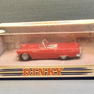A 999. Dinky cast car in box red