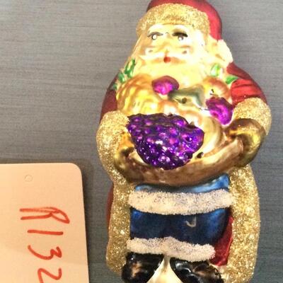 R 132 blown glass Santa ornament with basket of fruit