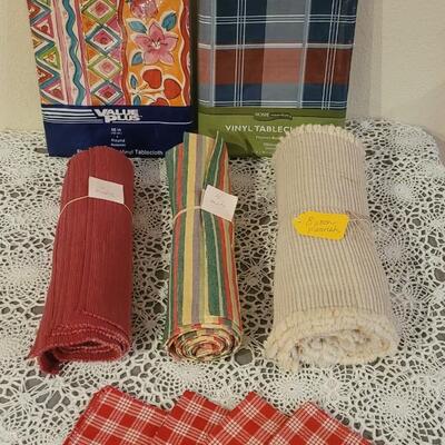 Lot 228: Vintage Napkins, 3 Sets of Placemats and 2 Vinyl Tablecloths