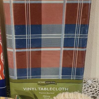 Lot 228: Vintage Napkins, 3 Sets of Placemats and 2 Vinyl Tablecloths