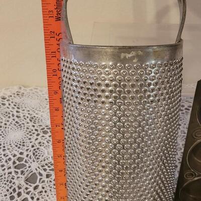 Lot 244: Vintage Baking Lot - Extra Large Grater, Wood Rolling Pin and Muffin Pan