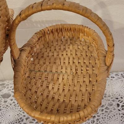 Lot 247: (2) Raffia Baskets and (1) Large Basket with Leather Handles