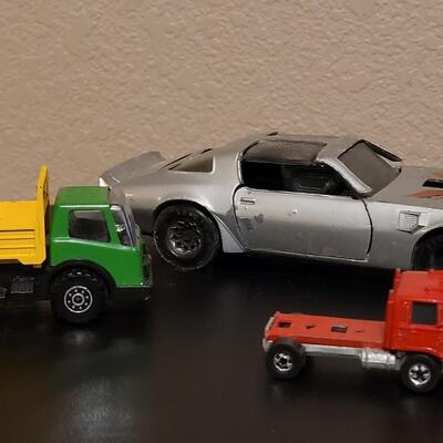 Lot 270: Vintage Yatmina Trans Am, Small Tonka Dump Truck and Matchbox Truck