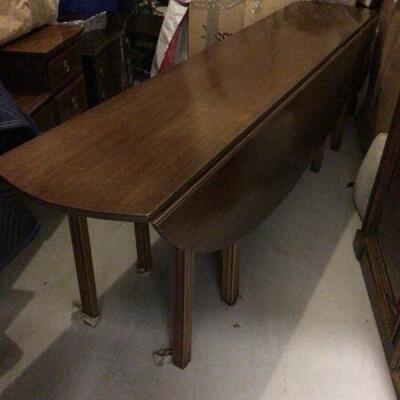 Long oval drop leaf dining table