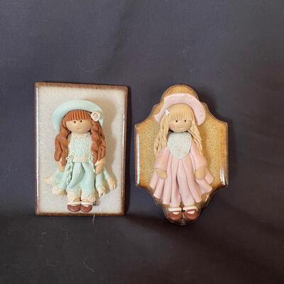 Decorative Clay Dolls on Tiles