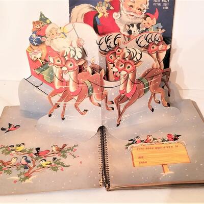 Lot #272  Two Vintage Christmas Children's books - one a pop-up