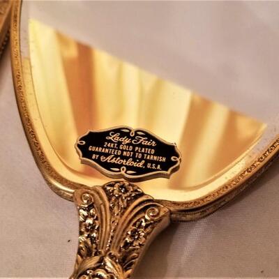 Lot #274  Vintage Vanity Set - Mirror, Brushes, Comb