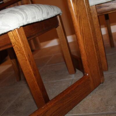 Large wood dinning room table and 6 chairs with 2 table leaf in over 9' long