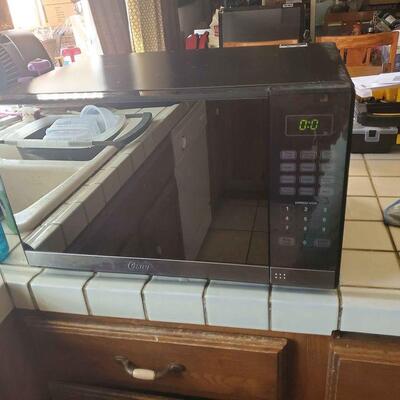 Oster microwave oven model EG03AL7-X1 13 in W: 21 in Depth: 17 Great working condition