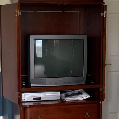 Lot 292: Entertainment Wardrobe/ Media Cabinet (Electronics Included)