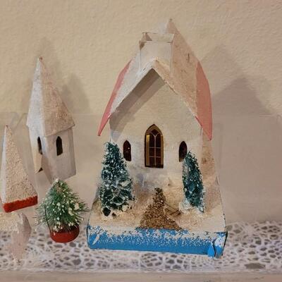 Lot 25: Vintage Putz Paper/Cardboard Christmas Houses - 13 total Buildings includes the Church