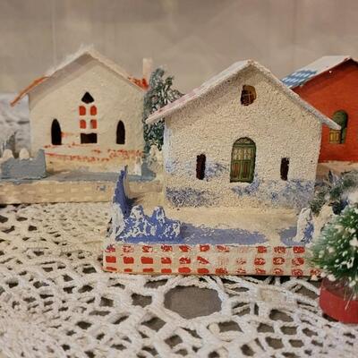 Lot 25: Vintage Putz Paper/Cardboard Christmas Houses - 13 total Buildings includes the Church