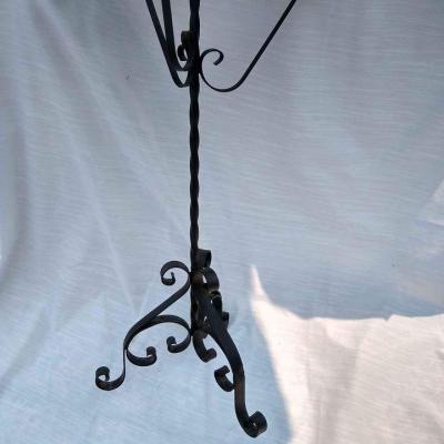 Cast iron bookstand, restaurant menu or wedding book sign in stand, music stand