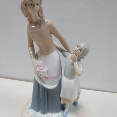 Porcelain Figurine - Marked 