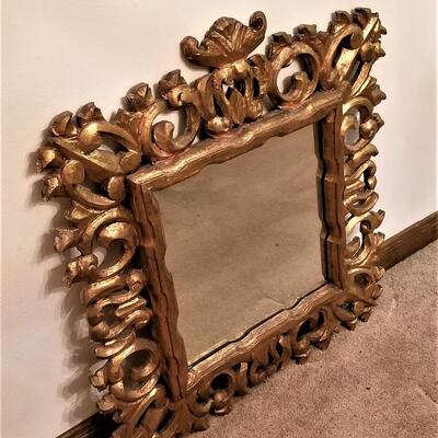 Lot #307  Large Heavy Wooden Mirror - highly decorative