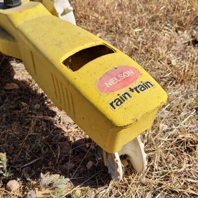 Lot 90: Vintage NELSON Rain Train Yellow Farm Tractor Yard Sprinkler