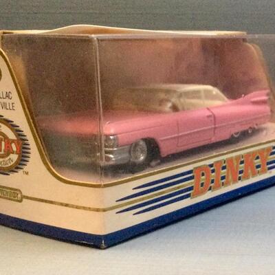 Dinky die cast car, pink, 1959 Cadillac coup de ville pink white top