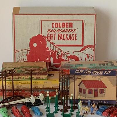 Lot 403: Vintage Tootsie Toys, Colber Railroad Gift Package, Train House Kits & More