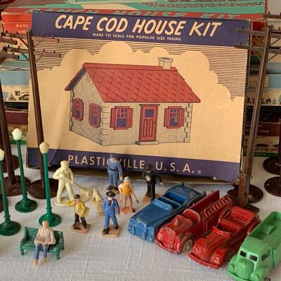 Lot 403: Vintage Tootsie Toys, Colber Railroad Gift Package, Train House Kits & More