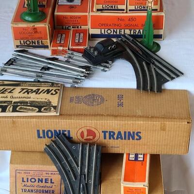 Lot 402: Lionel Trains: Transformer, Tracks, Barrel Loader, Signals and More
