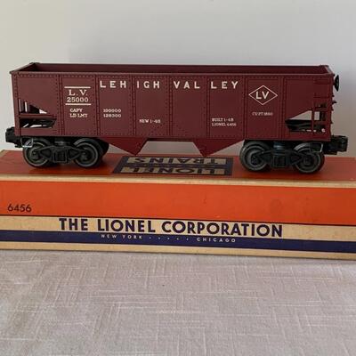 Lot 402: Lionel Trains: Transformer, Tracks, Barrel Loader, Signals and More