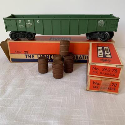 Lot 402: Lionel Trains: Transformer, Tracks, Barrel Loader, Signals and More