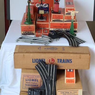 Lot 402: Lionel Trains: Transformer, Tracks, Barrel Loader, Signals and More