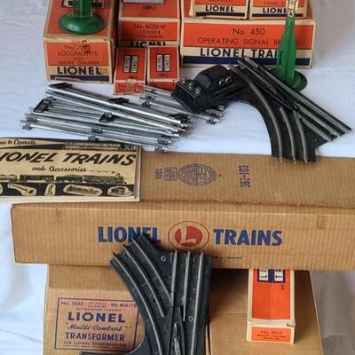 Lot 402: Lionel Trains: Transformer, Tracks, Barrel Loader, Signals and More