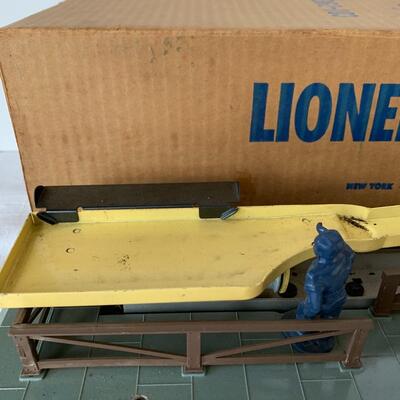 Lot 402: Lionel Trains: Transformer, Tracks, Barrel Loader, Signals and More