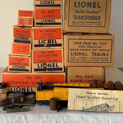Lot 402: Lionel Trains: Transformer, Tracks, Barrel Loader, Signals and More