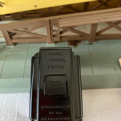 Lot 402: Lionel Trains: Transformer, Tracks, Barrel Loader, Signals and More