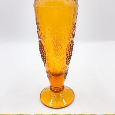 VINTAGE 6â€ AMBER FOOTED VASE W/GRAPE DESIGN