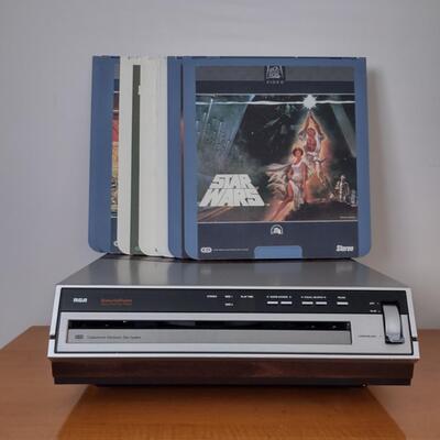 Lot 363: RCA Select A Vision Video Disc Player With Video Discs & Box