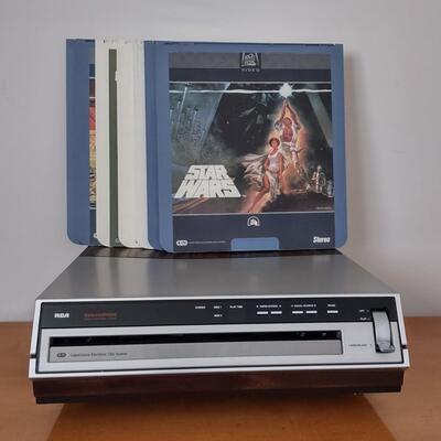 Lot 363: RCA Select A Vision Video Disc Player With Video Discs & Box