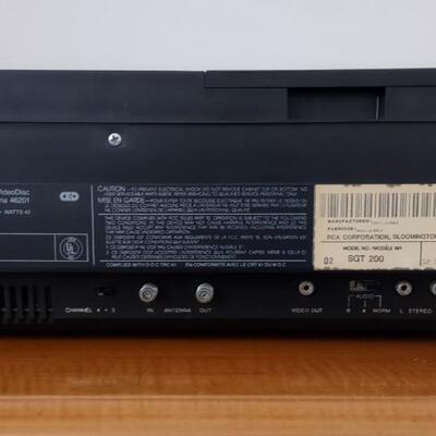 Lot 363: RCA Select A Vision Video Disc Player With Video Discs & Box
