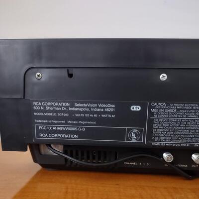 Lot 363: RCA Select A Vision Video Disc Player With Video Discs & Box