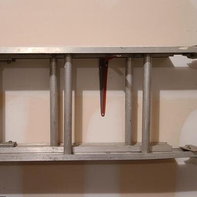 Lot 389: Aluminum Extension Ladder and Wood Scaffolding