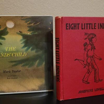 Lot 127: "Eight Little Indians" and "The Winds' Child" Book Lot