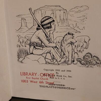 Lot 127: "Eight Little Indians" and "The Winds' Child" Book Lot